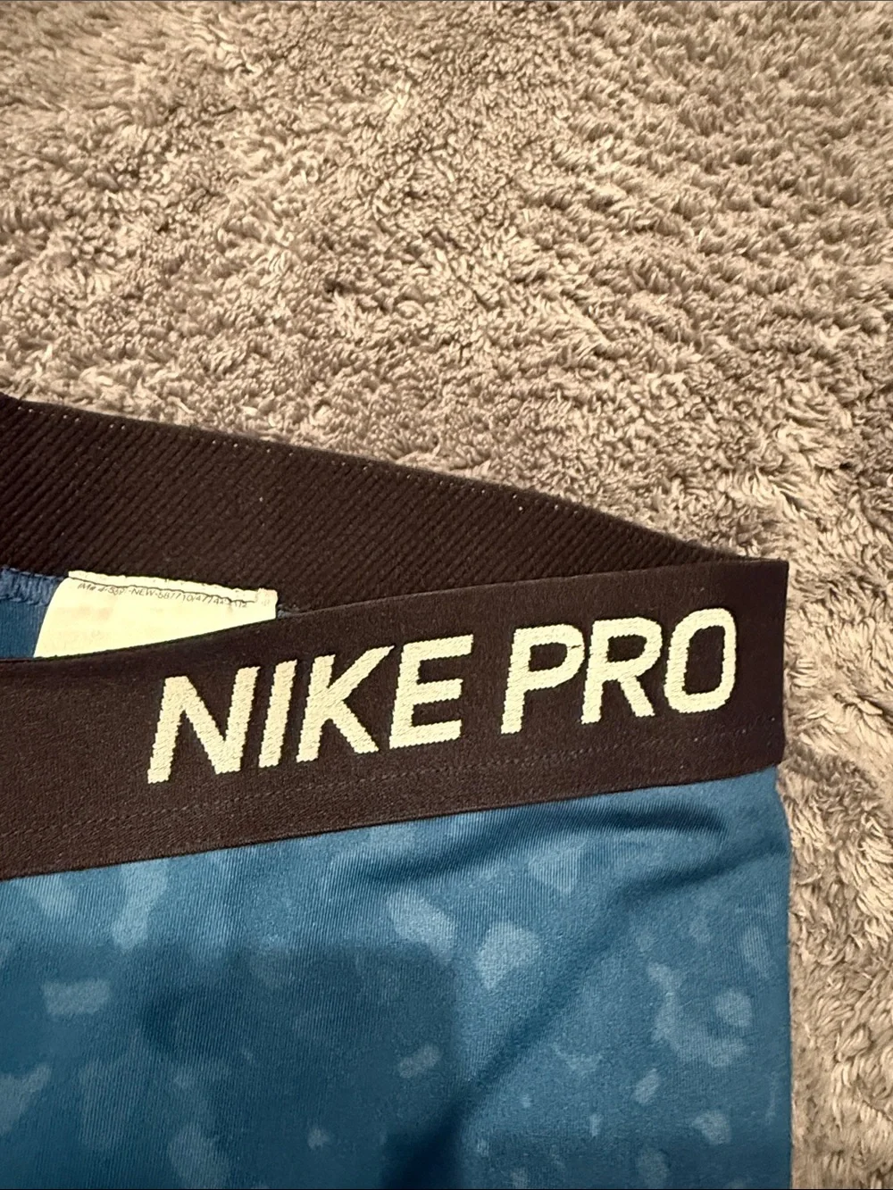 Nike Women's Teal Blue Performance Leggings with Subtle Print